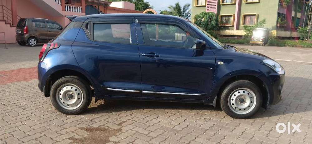 Maruti Suzuki Swift 1.2 Lxi (o), 2022, Petrol