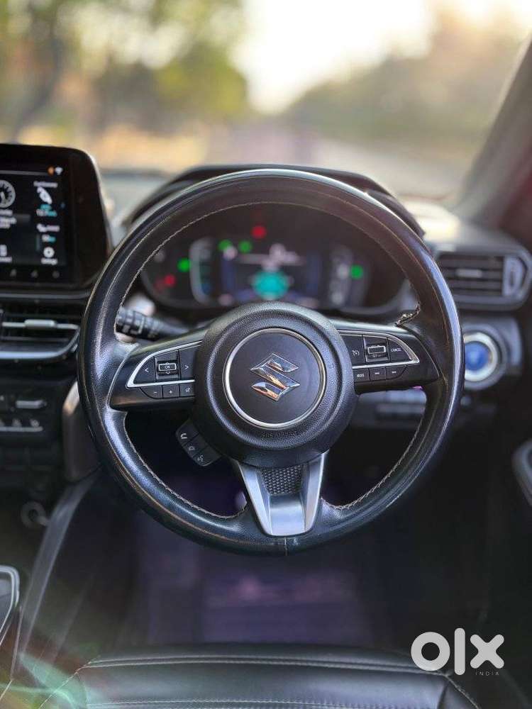 Maruti Suzuki Grand Vitara 1.5 Zeta Plus Dual Tone Intelligent Hybri..