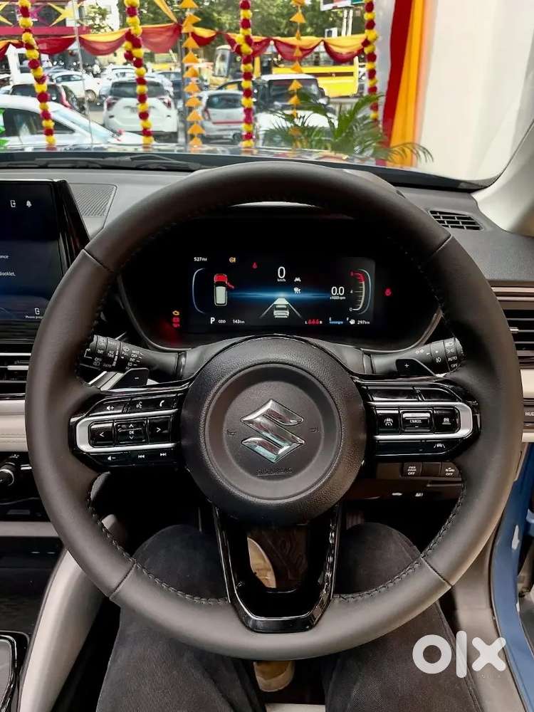 Maruti Suzuki Victoris Zxi +