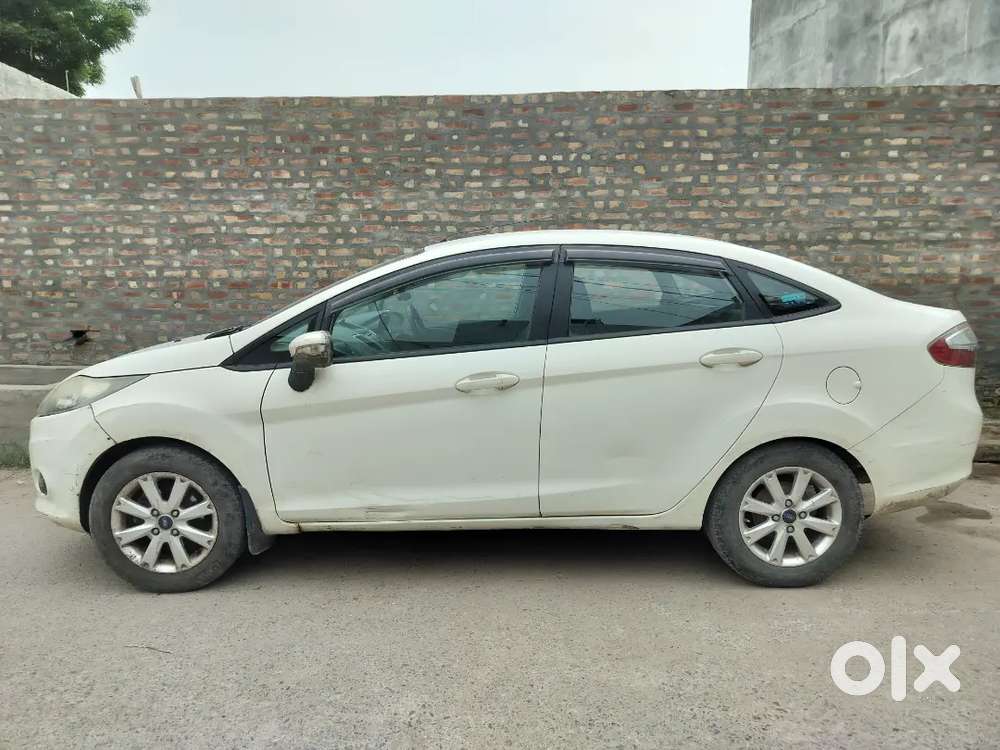 2012 Ford Fiesta Titanium  Petrol + Cng  77,000 Km Driven