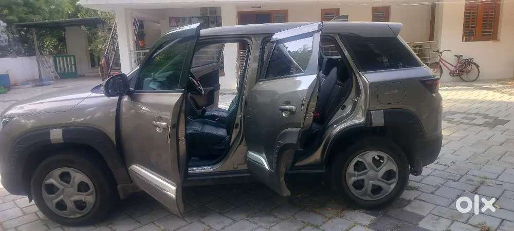 Maruti Suzuki Brezza Vxi 2024