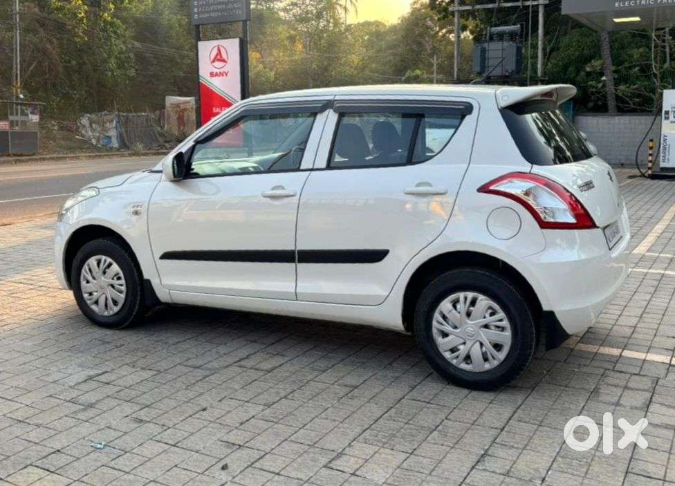 Maruti Suzuki Swift Lxi Optional-o, 2015, Petrol