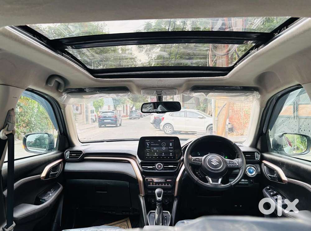 Maruti Suzuki Grand Vitara 1.5 Zeta Plus Dual Tone Intelligent Hybri..