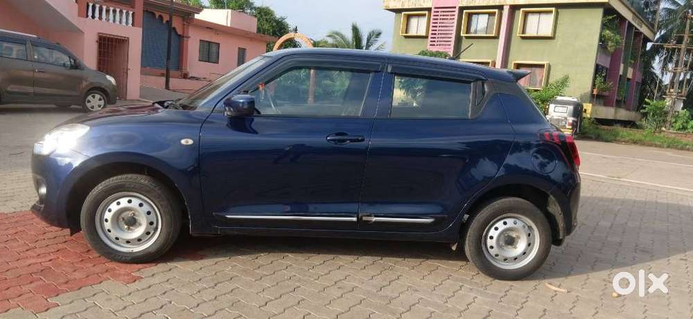 Maruti Suzuki Swift 1.2 Lxi (o), 2022, Petrol