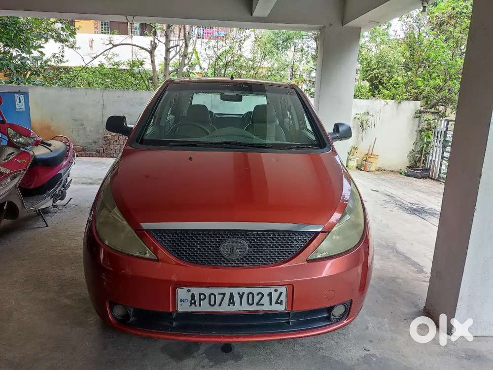 Tata Indica Vista Aura Tdi Ls - Solar Orange Colour