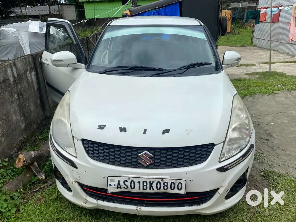Maruti Suzuki Swift Lxi 2014