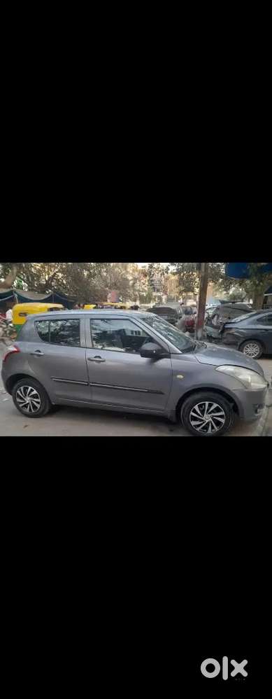 Maruti Suzuki Swift Lxi 2014