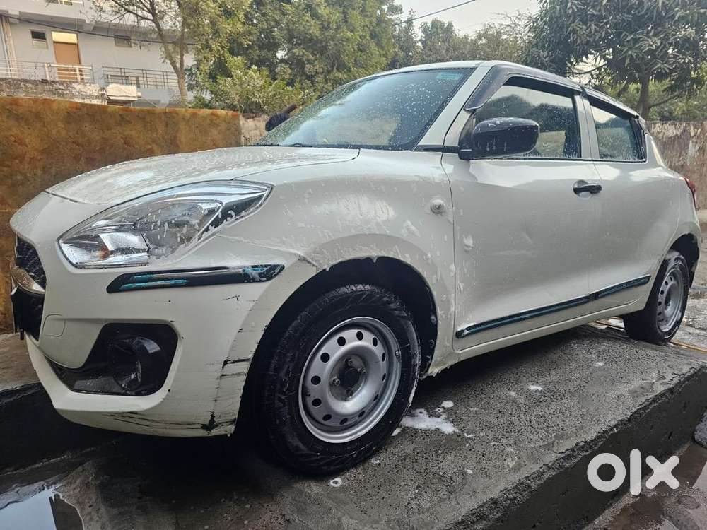 Swift , 2022, Petrol , White Color , 23200km Driven ,