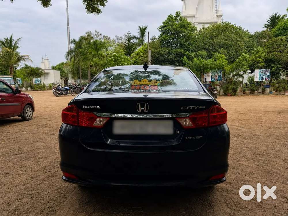 Honda City 2014 Black Colour Well Maintained Petrol Vehicle For Sale.