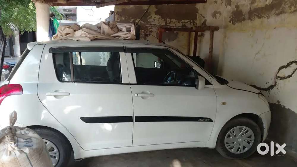 Maruti Suzuki Swift Lxi 2011