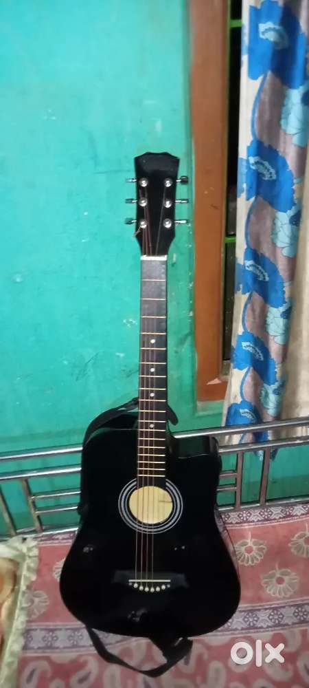 Revel Acoustic Guitar 38c
₹2000