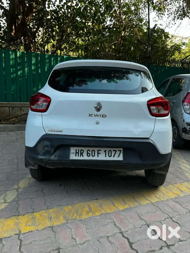 A Renault Kwid Rxt 0.8 In White Colour Only 30,000 Km Driven Hr Number