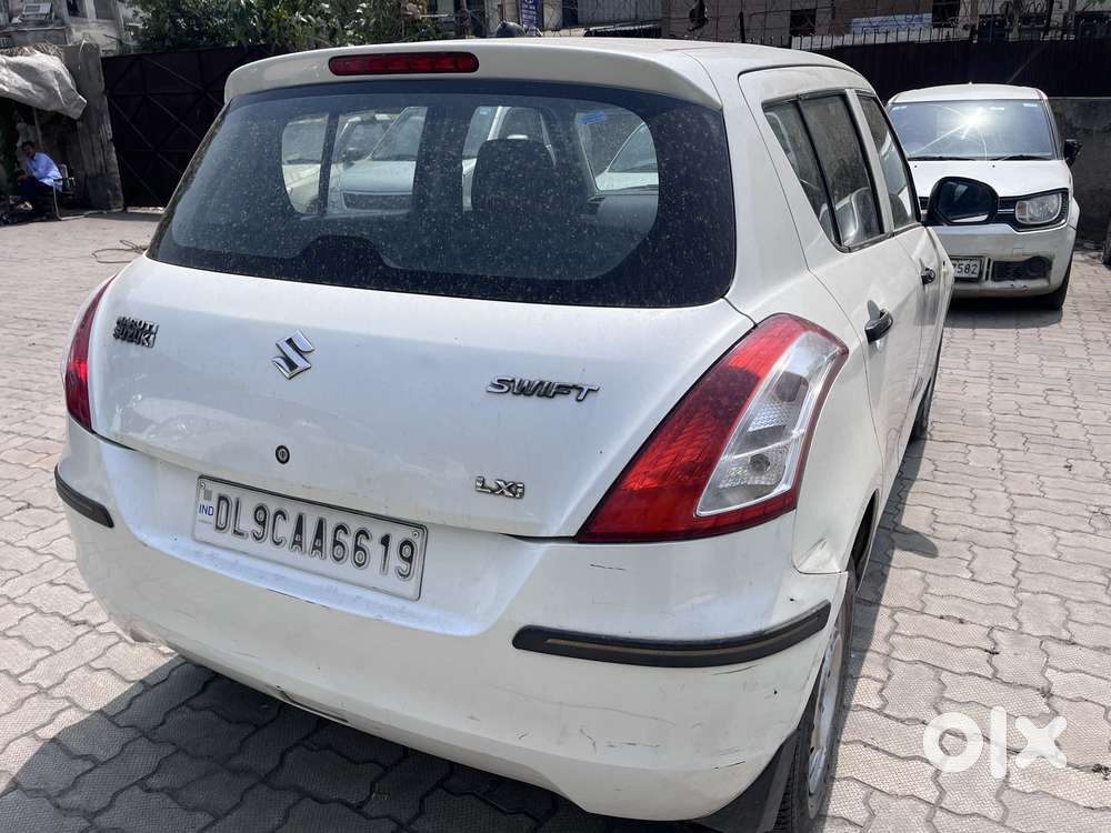 Maruti Suzuki Swift 1.2 Lxi (o), 2014, Petrol