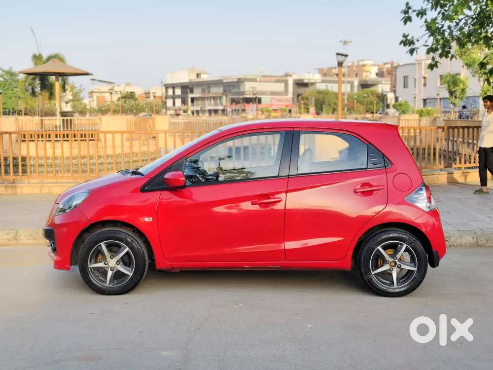 Honda Brio Sporty Look 
 Magwiil Spot Tire Center Lock