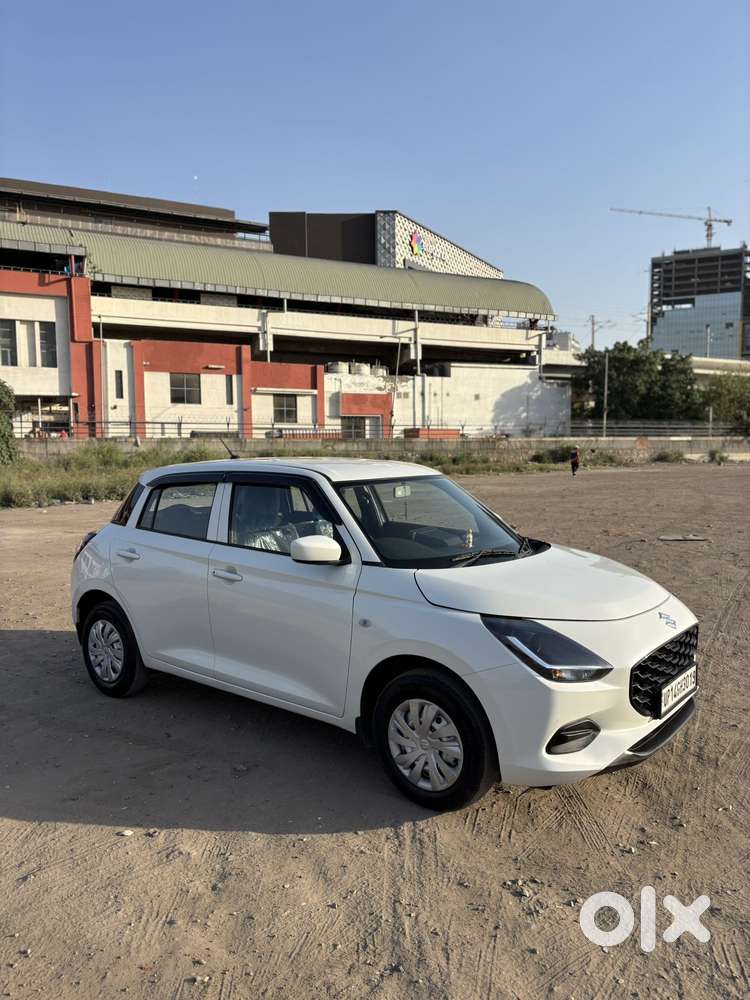 Maruti Suzuki Swift 1.2 Lxi (o), 2024, Petrol
