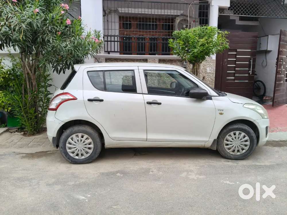 Maruti Suzuki Swift 2014 Petrol 89000 Km Single Hand Driven Pearl Whit