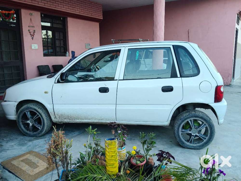 White Colour Zen In Good Condition With Modified Allow Wheel And Tyres