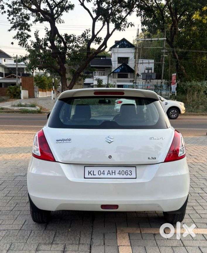 Maruti Suzuki Swift Lxi Optional-o, 2015, Petrol