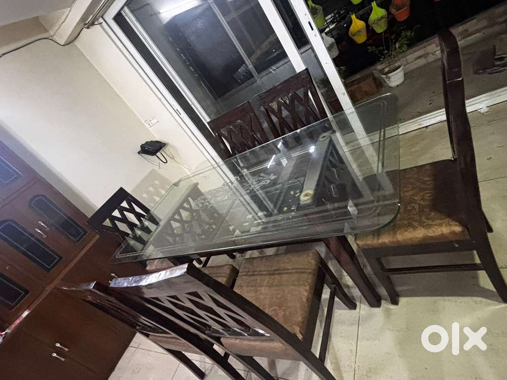 Wooden dining table with glass top 3 ft x 6 ft with wooden chairs