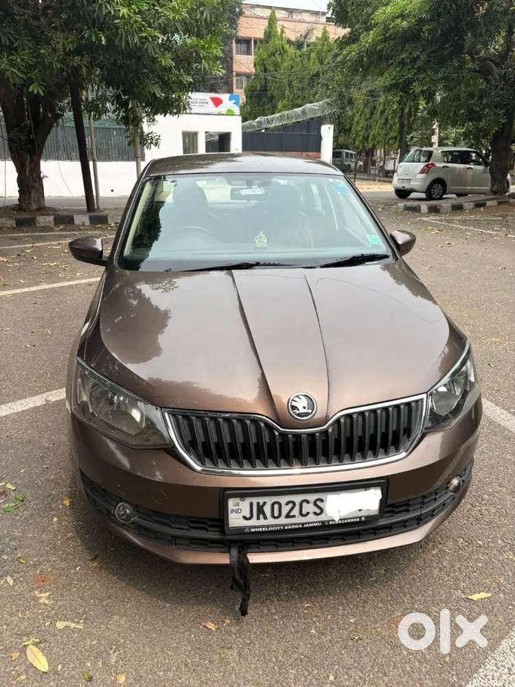 Brown Colour Skoda Rapid Turbro Charge Full Maintained Car