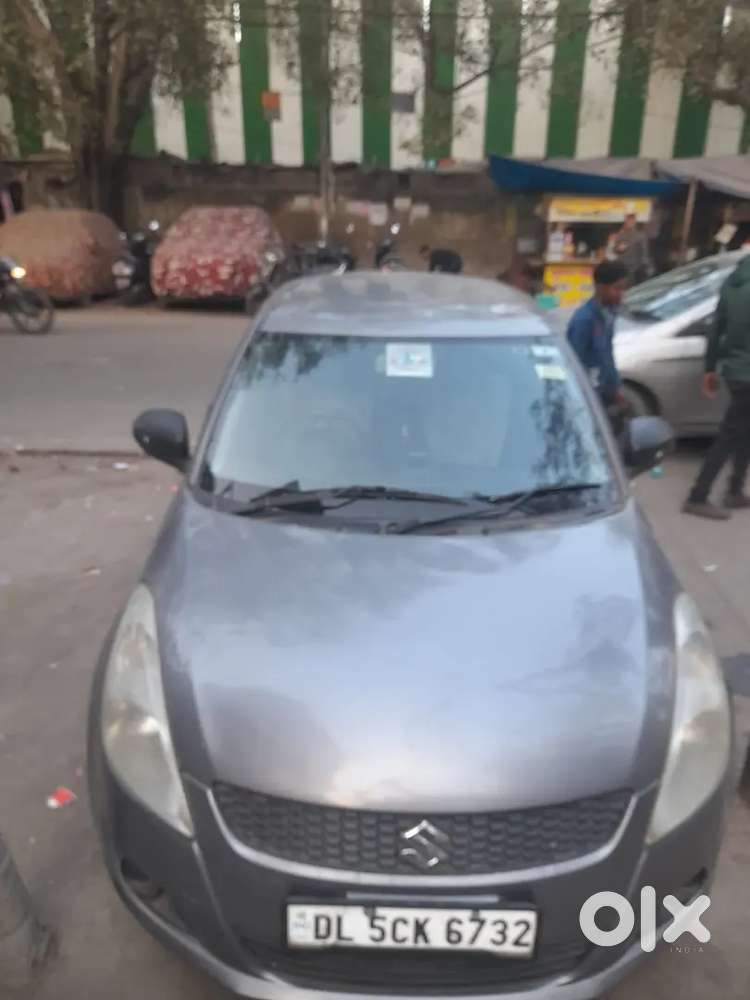 Maruti Suzuki Swift Lxi 2014