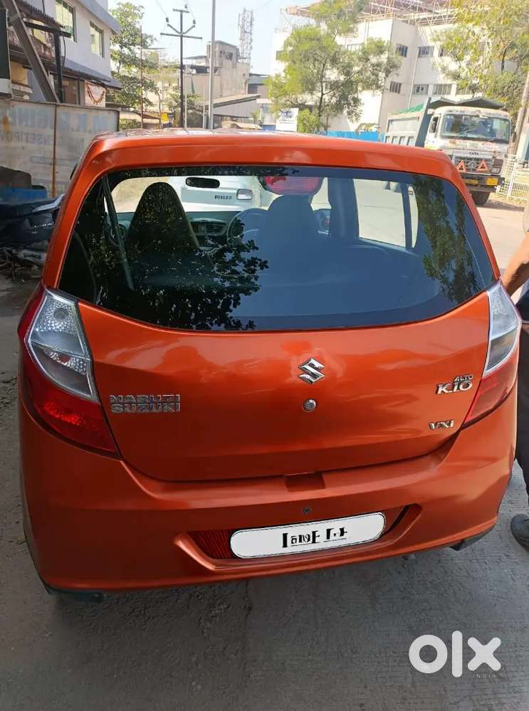 Maruti Suzuki Alto K10 2016 Orange Colour In A Good Condition.