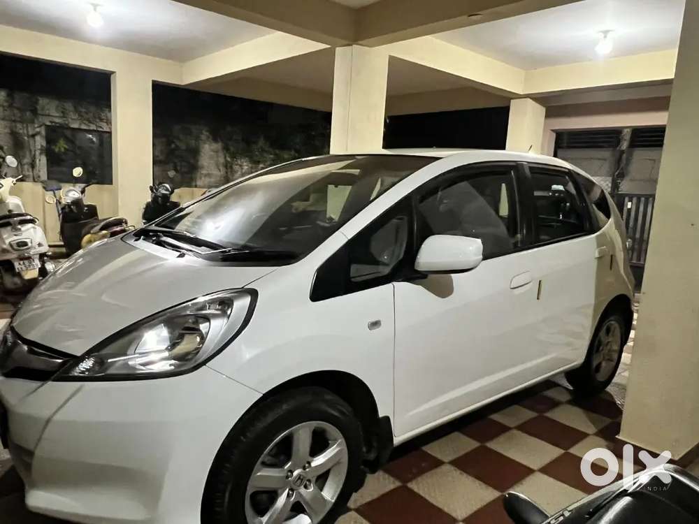 White Car With Showroom Record