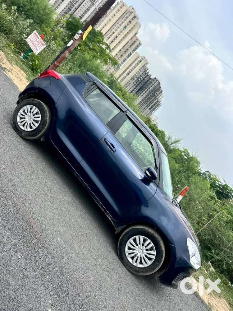Maruti Suzuki Swift 1.2 Vxi (o), 2023, Petrol