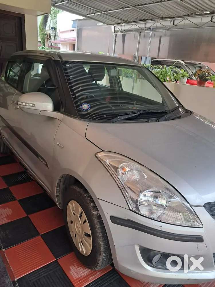 Maruti Suzuki Swift 2013 S Silver Petrol 59000 Km Driven