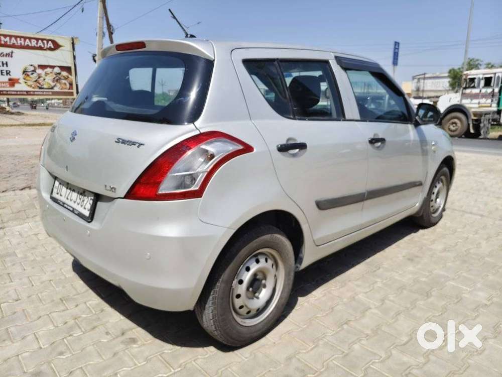 Maruti Suzuki Swift Lxi Optional-o, 2016, Petrol
