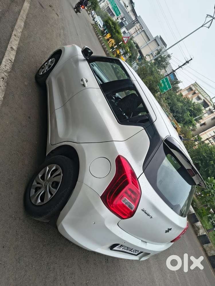 Maruti Suzuki Swift 1.2 Vxi (o), 2023, Petrol