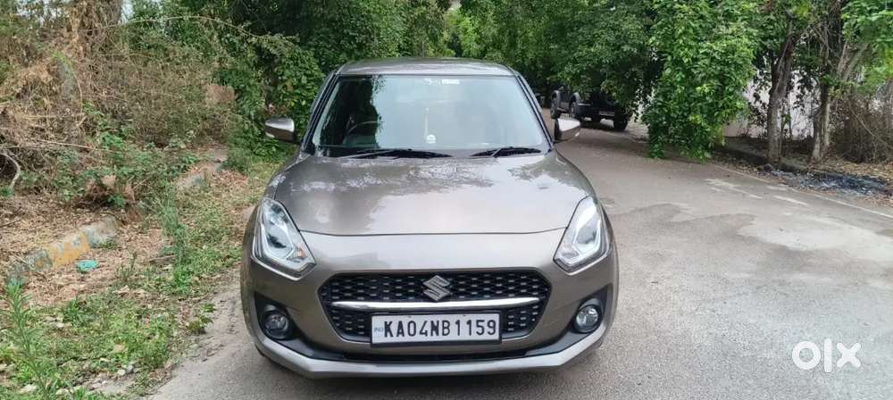 Maruti Suzuki Swift Zxi + Ags. 2022 Model. Single Owner. Compinsurance