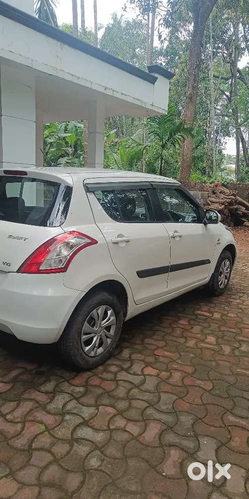Maruti Suzuki Swift Lxi 2016