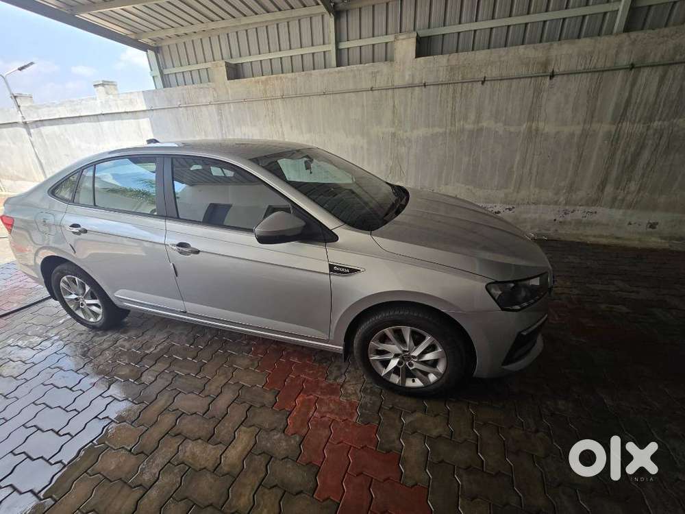 Slavia- Silver-10600 Kmtr New Car