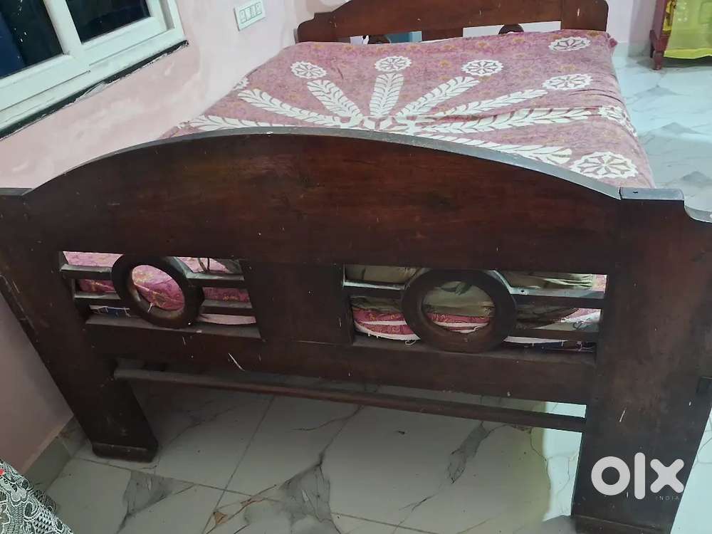 Wooden single bed