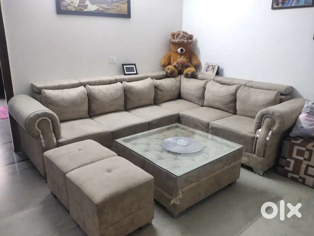 Six seater L shaped Sofa Set with centre table and 2 puff Sofa