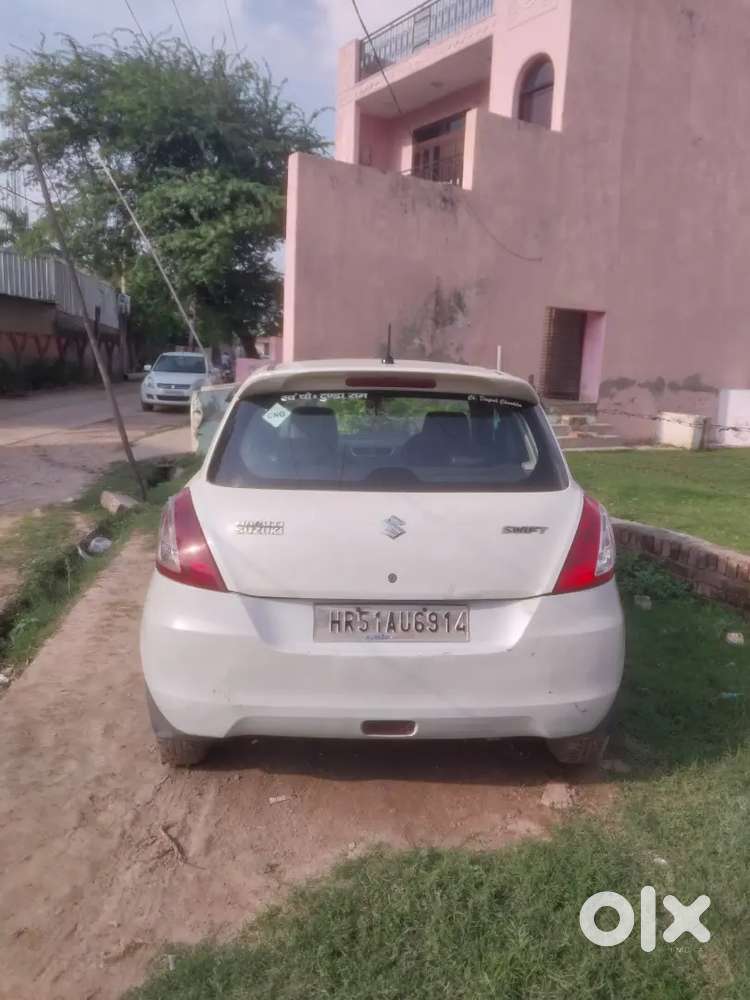 Maruti Suzuki Swift Lxi 2014