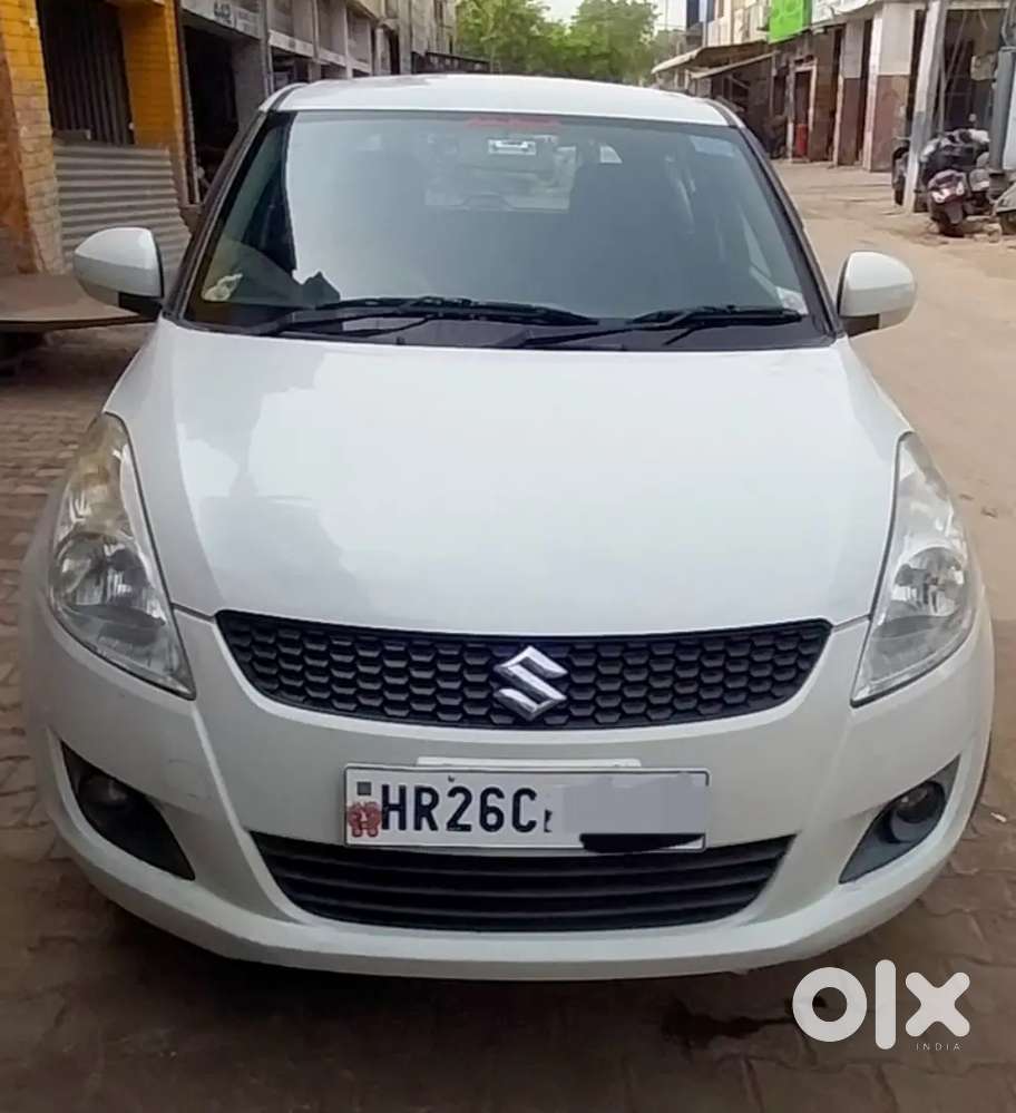 Maruti Suzuki Swift Lxi 2014