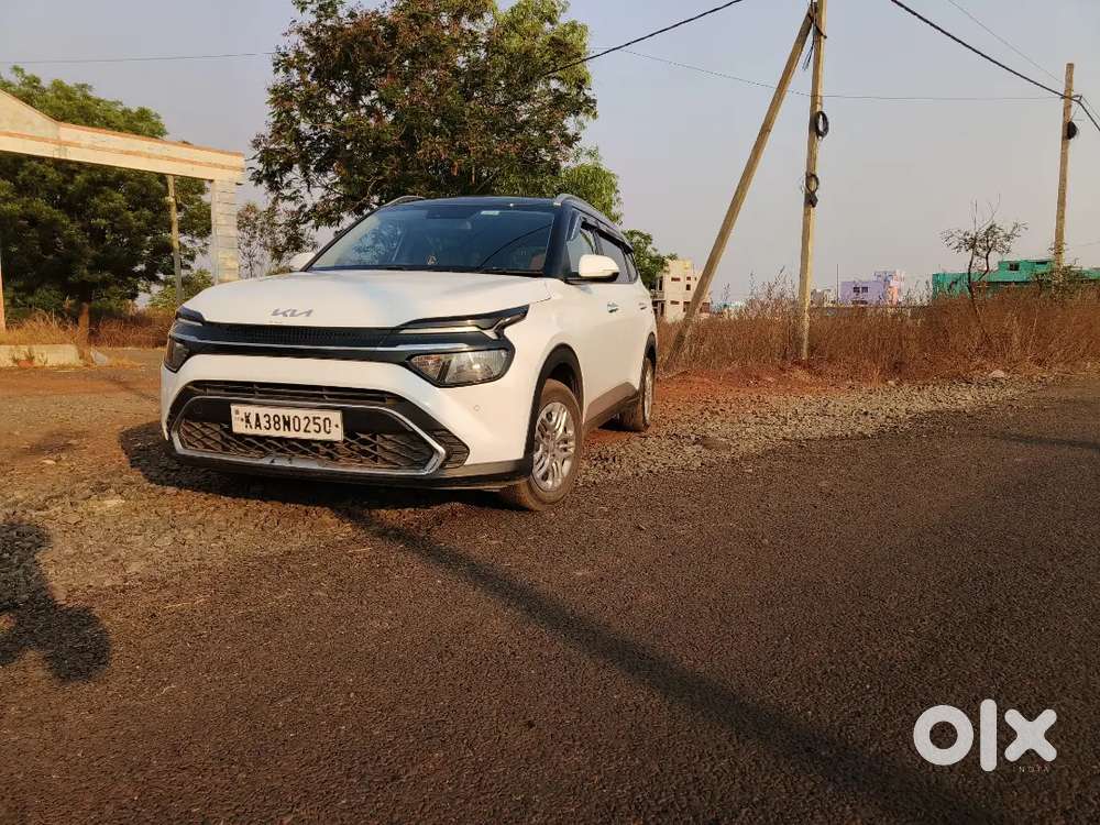 Kia Carens Prestige Glacier White 1st Owner 9.9 Lakh Only Fixed