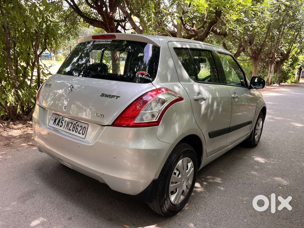 Maruti Suzuki Swift Lxi Optional-o, 2016, Petrol