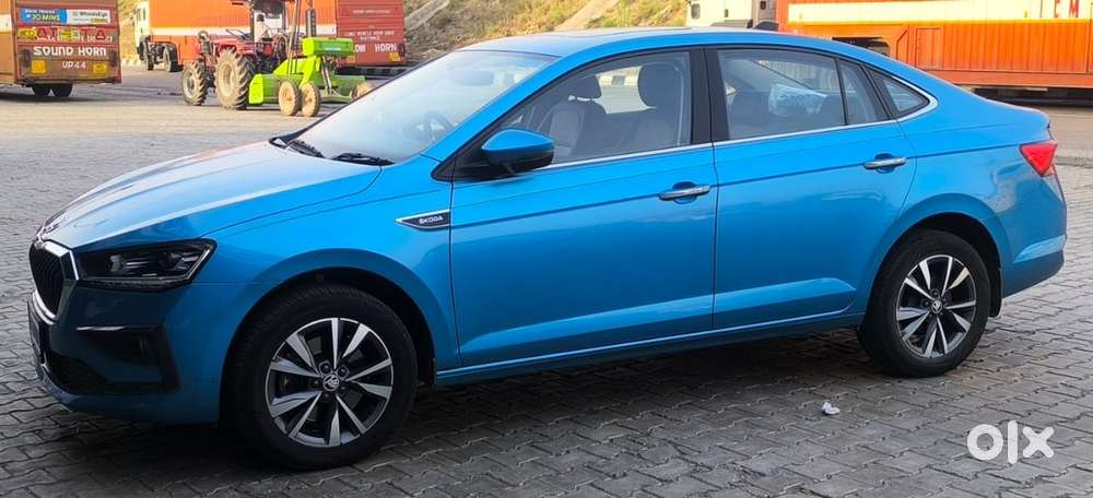 Crystal Blue Skoda Slavia Petrol 2024