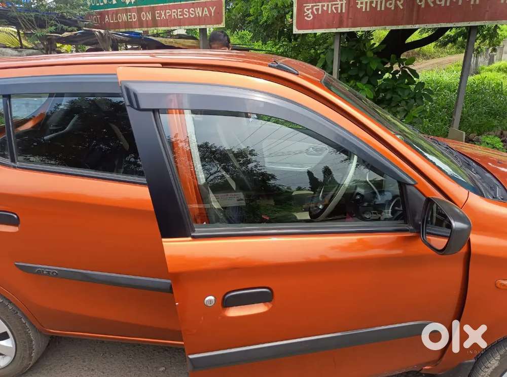 Maruti Suzuki Alto K10 2016 Orange Colour In A Good Condition.