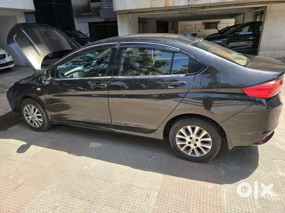 *honda City 
*1.5 Sv Mt(idtech)  1.5 S Mt
* 2014
* 9.3 K
* G Brown M
*