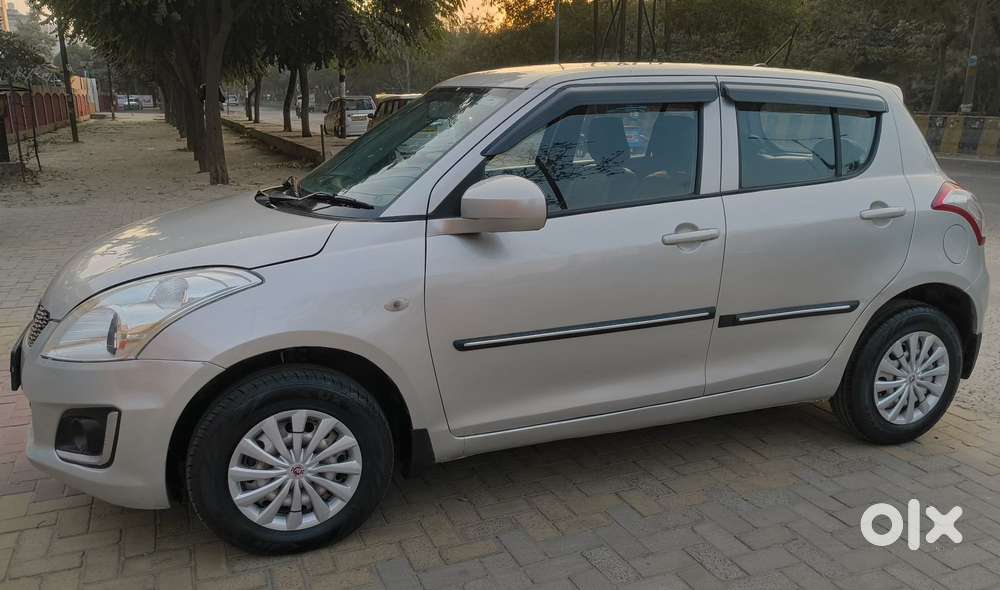 Maruti Suzuki Swift Lxi Optional-o, 2017, Petrol