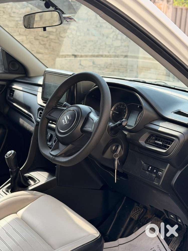 Maruti Suzuki Brezza 1.5 Lxi Smart Hybrid, 2025, Petrol