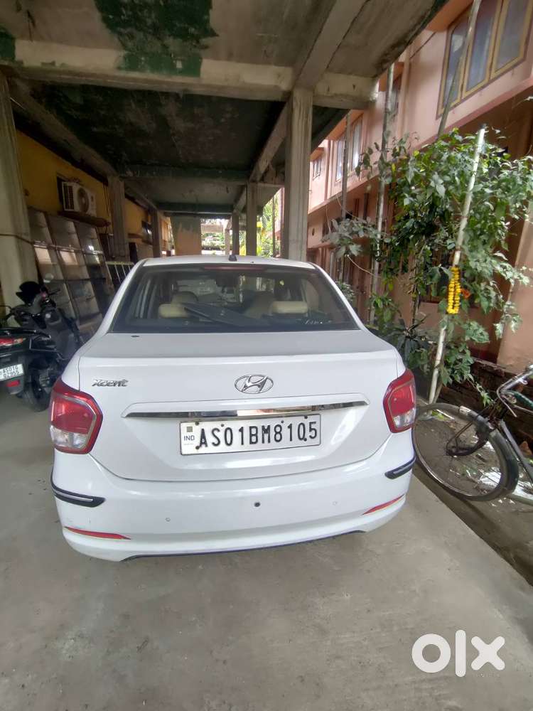 White Colour Hyundai Xcent Like Brand New Condition For Sale.