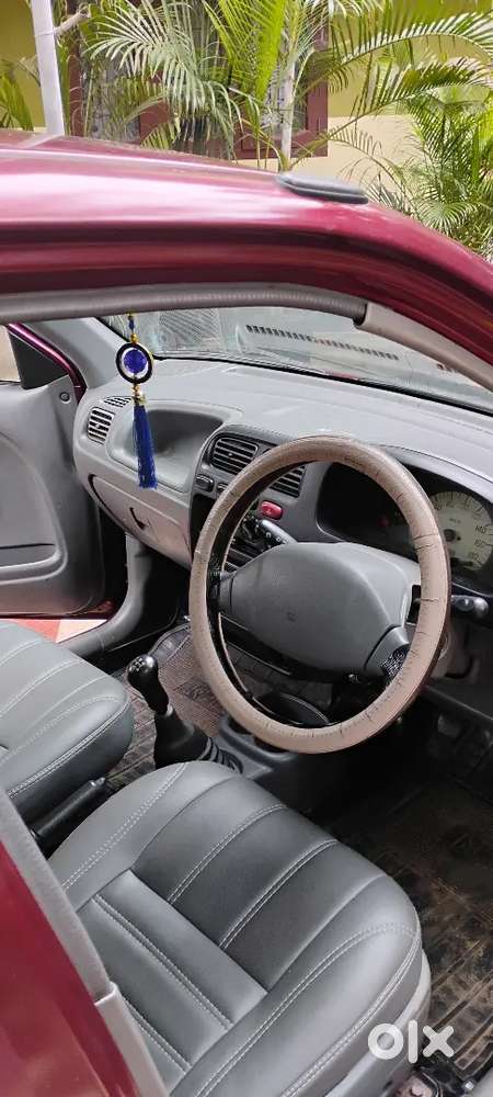 Alto Lxi 2009 Model With 100900 Km And Red Wine Colour.