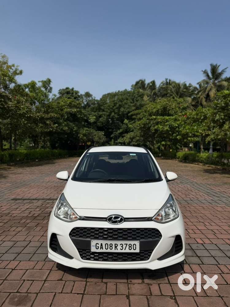 Hyundai Grand I10 Magna 1.2 Petrol  White  1st Owner  94,000 Kms