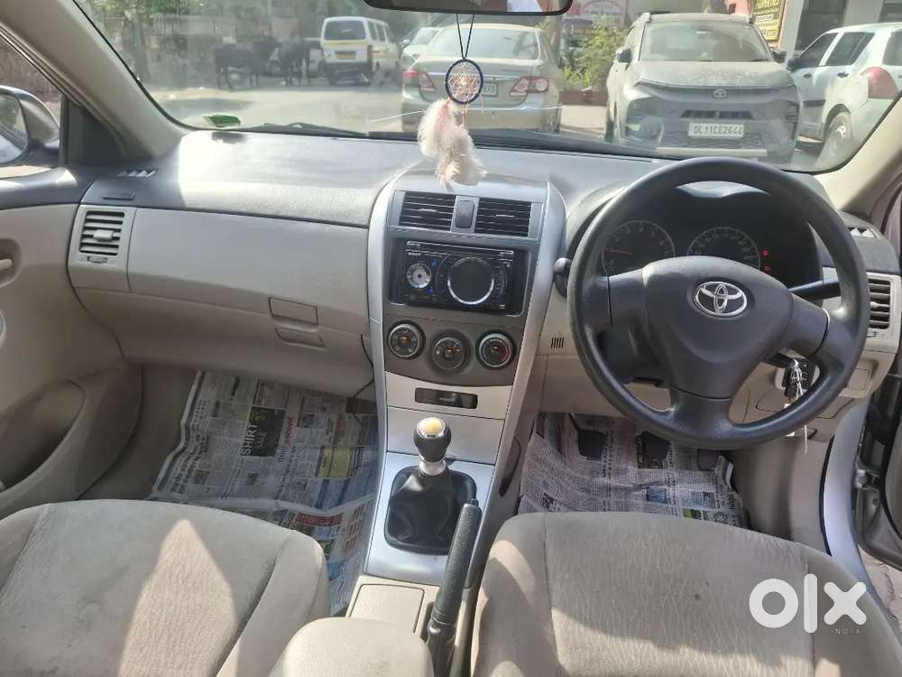 Corolla Altis J
2012,(model,march)
2nd Owner 
Petrol
Km=98,000