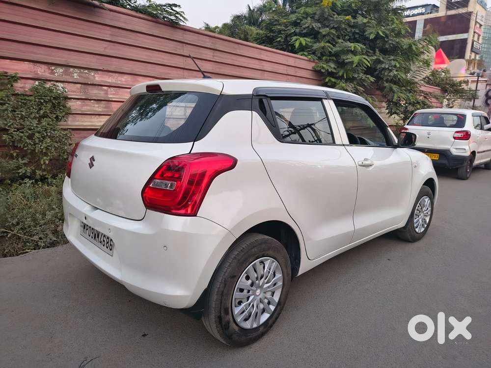 Maruti Suzuki Swift 1.2 Lxi (o), 2022, Petrol